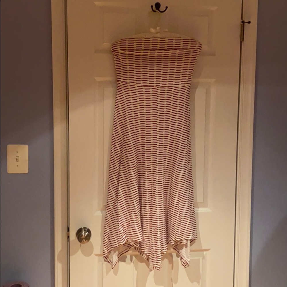 Décolleté dress with cute back details